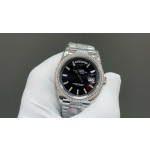 Sunday Calendar series women's watch, black dial, silver bezel, 36mm, with diamond-set silver President-style bracelet.